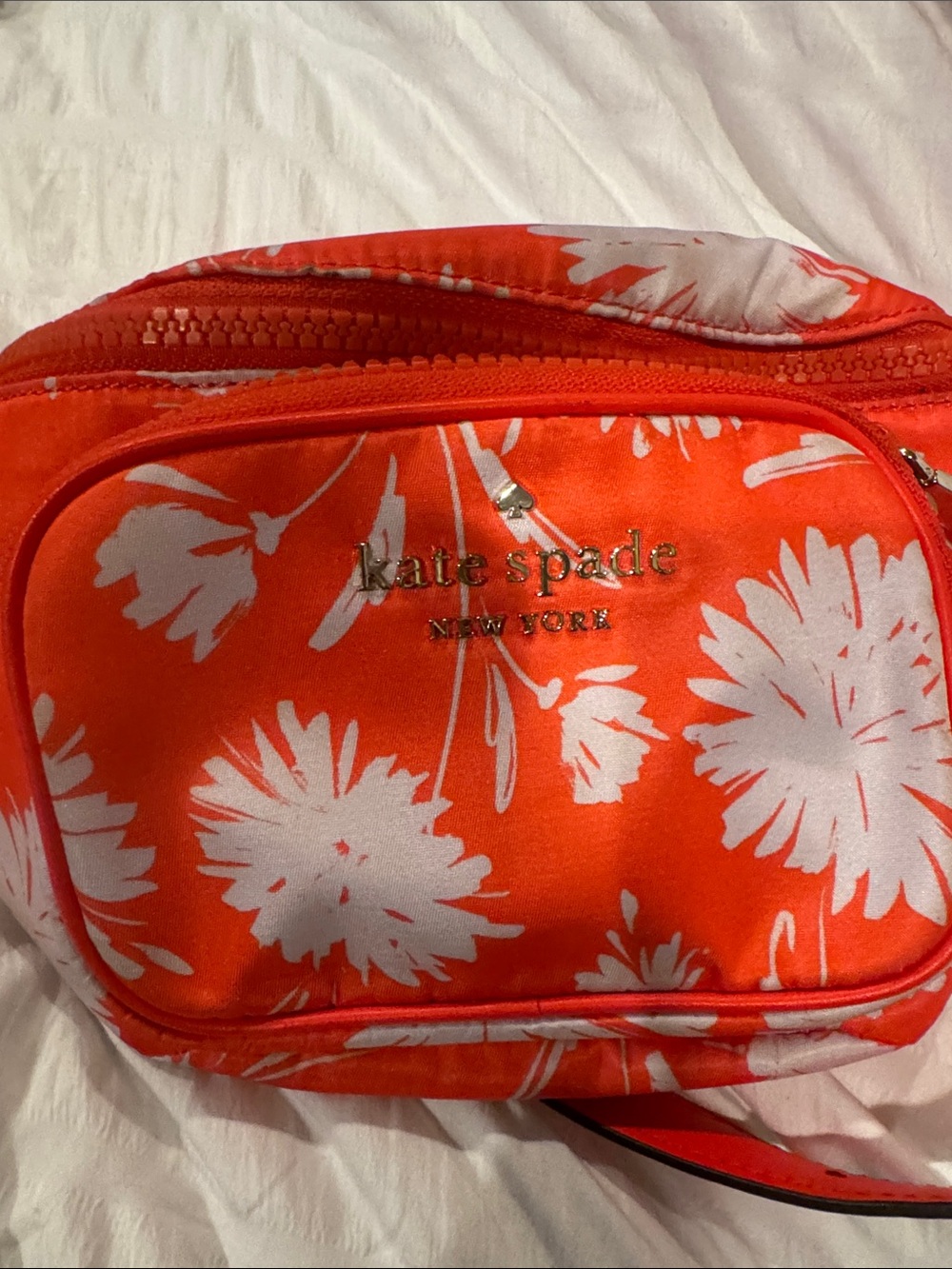 Excellent condition kate spade orange and white floral crossbody pouch